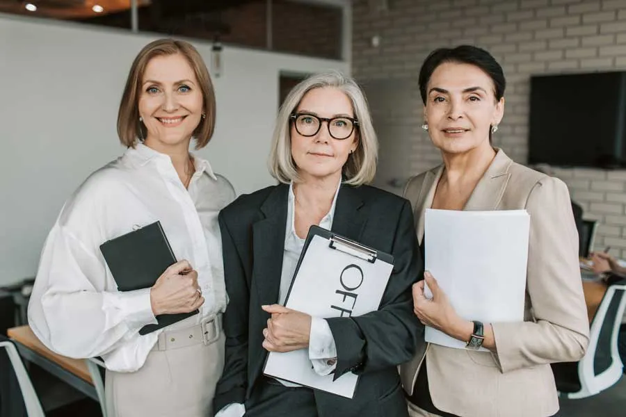 3 professional lady standing and happy